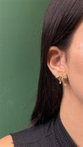 Brinco Laço Dourado Cravejado com Zircônias